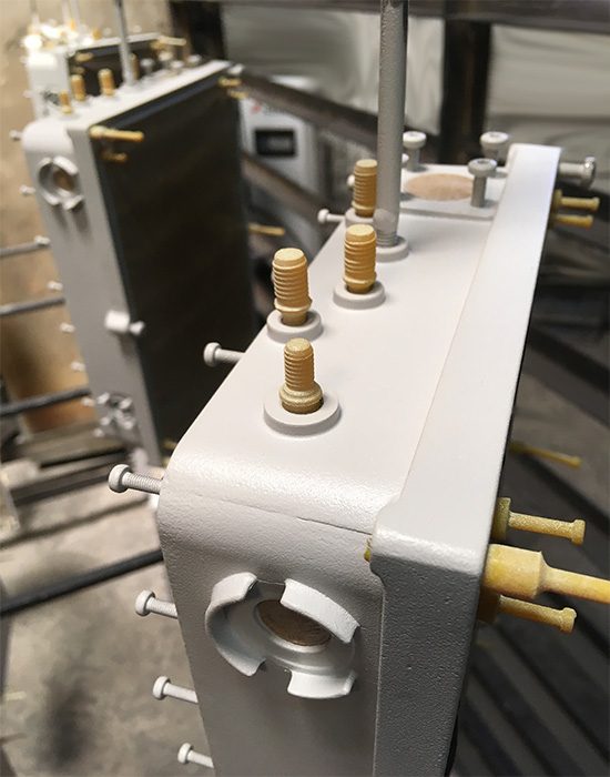 Powder coating spray booth with masking preparation